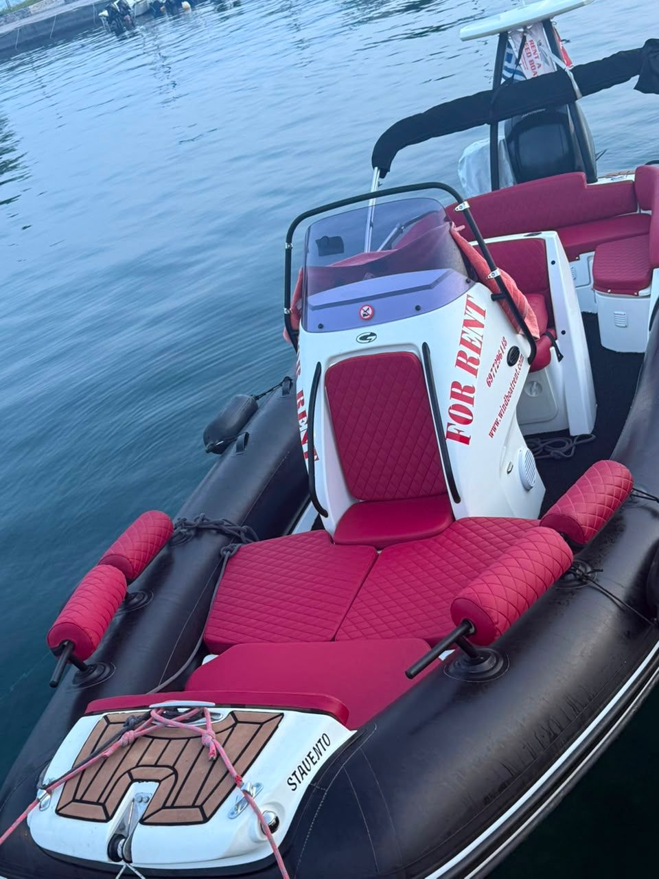 Wind Boat 6.5m cockpit angle and red seating view in Skopelos
