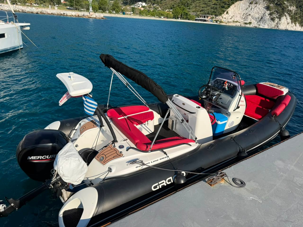 Wind Boat 6.5m docked in Skopelos waters